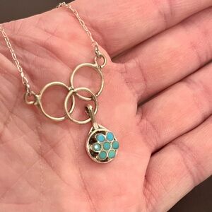 Elegant Silver and Turquoise Pendant Necklace